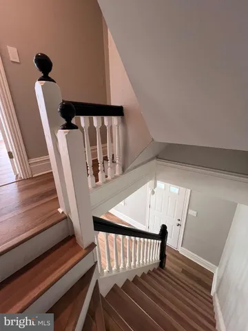a view of entryway with wooden floor