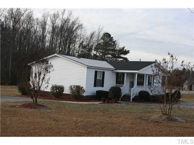 799 Bakers Chapel Road Princeton, NC 27569 - Photo 9 of 14 BEAUTIFUL LANDSCAPING AND COVERED FRONT PORCH