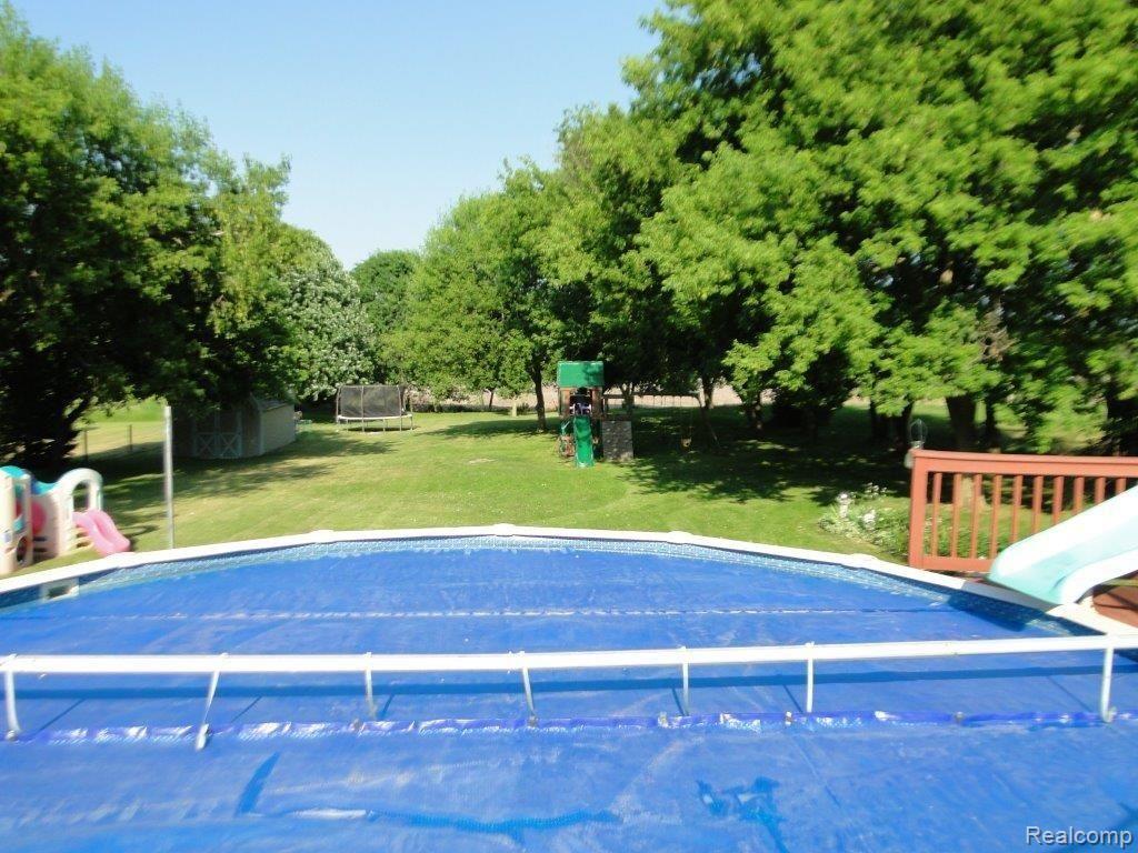5016 Laur Road North Branch, MI 48461 - Photo 44 of 46 Pool Overlooking Backyard
