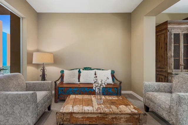 a living room with furniture and a couch