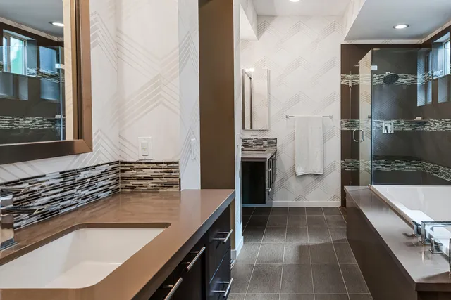 a kitchen with a sink and a refrigerator