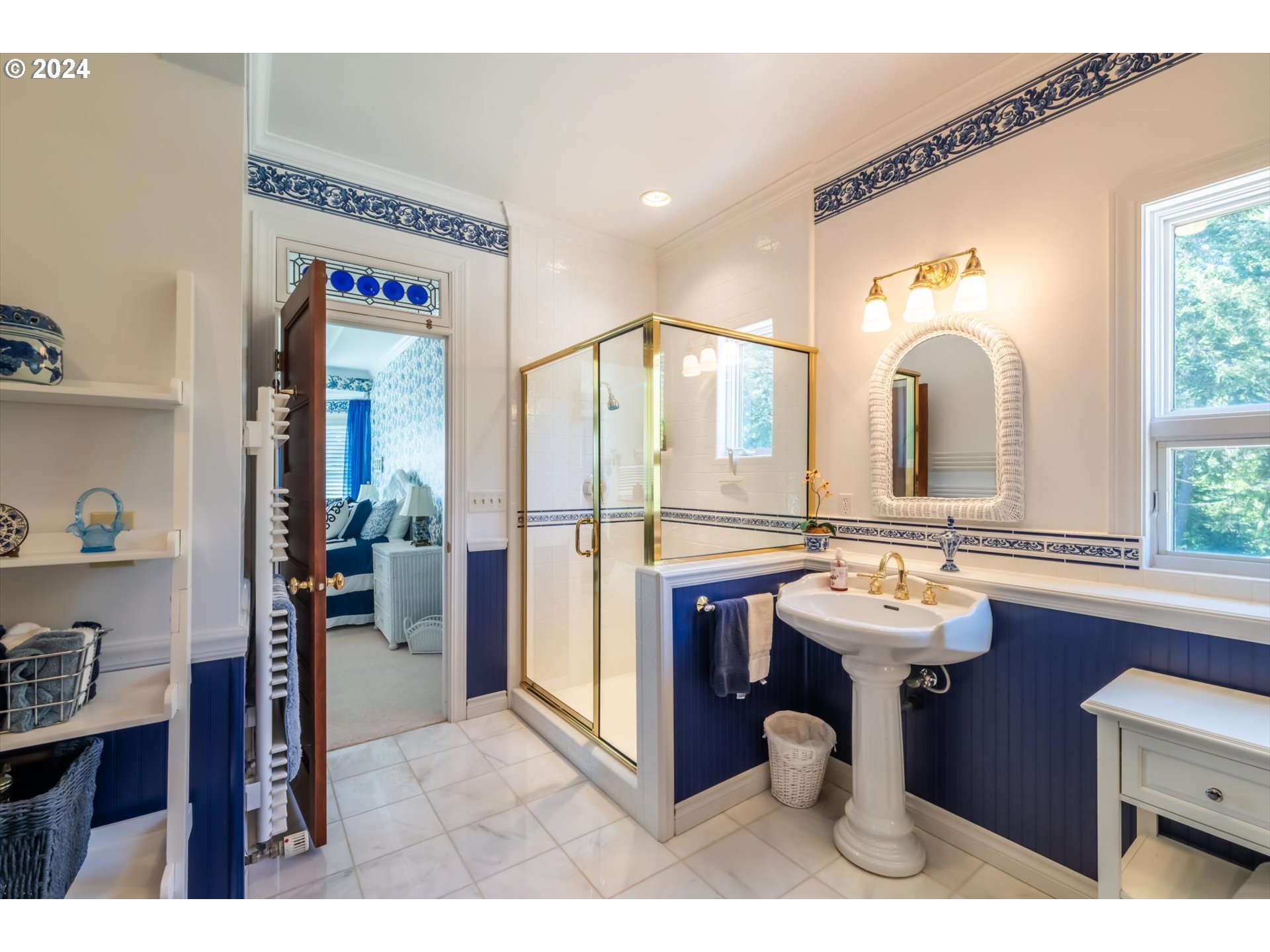 54980 Morrison Road Bandon, OR 97411 - Photo 12 of 48 a bathroom with a sink mirror and toilet
