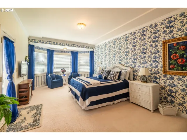 a bathroom with a toilet a sink and a window