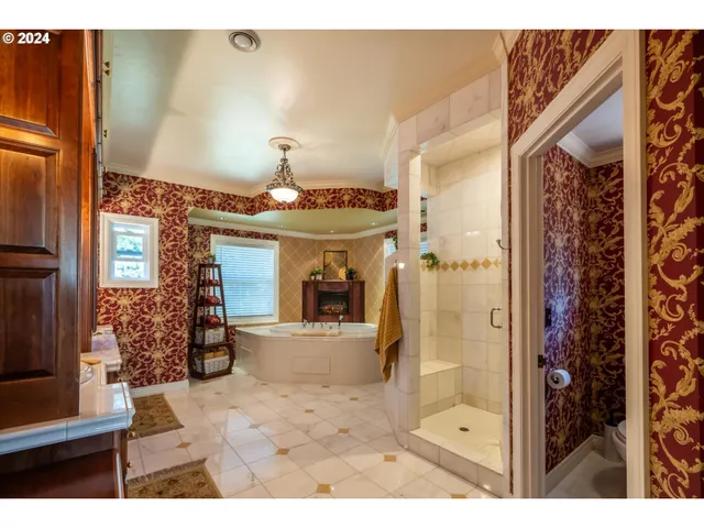 a bathroom with a toilet and a shower curtain