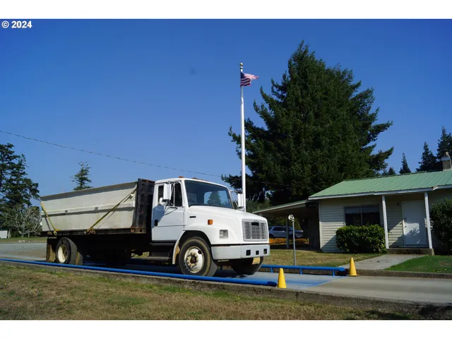 a living room with lots of furniture and a flat screen tv