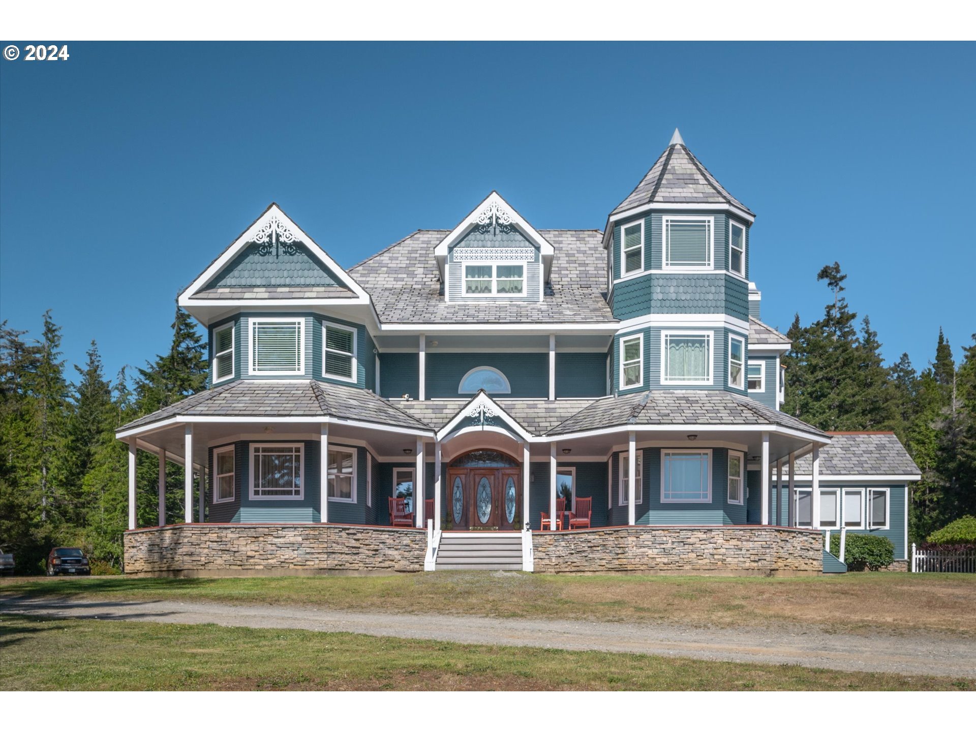 54980 Morrison Road Bandon, OR 97411 - Photo 7 of 48 a front view of residential houses