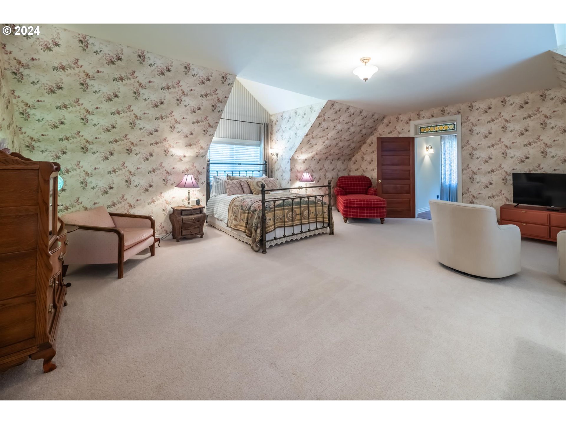 54980 Morrison Road Bandon, OR 97411 - Photo 10 of 48 a living room with furniture and a fireplace