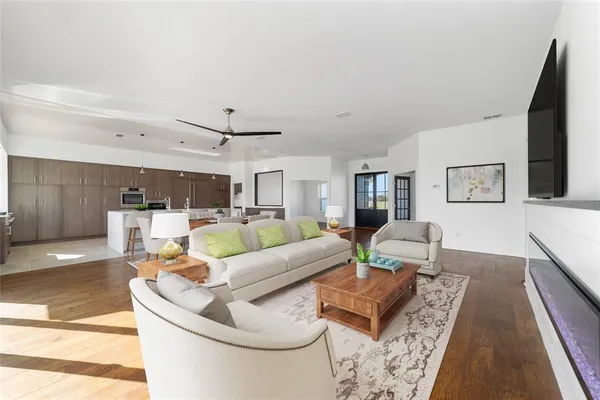 a bathroom with a bathtub shower sink and toilet