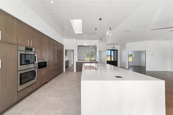 a view of a livingroom with wooden floor