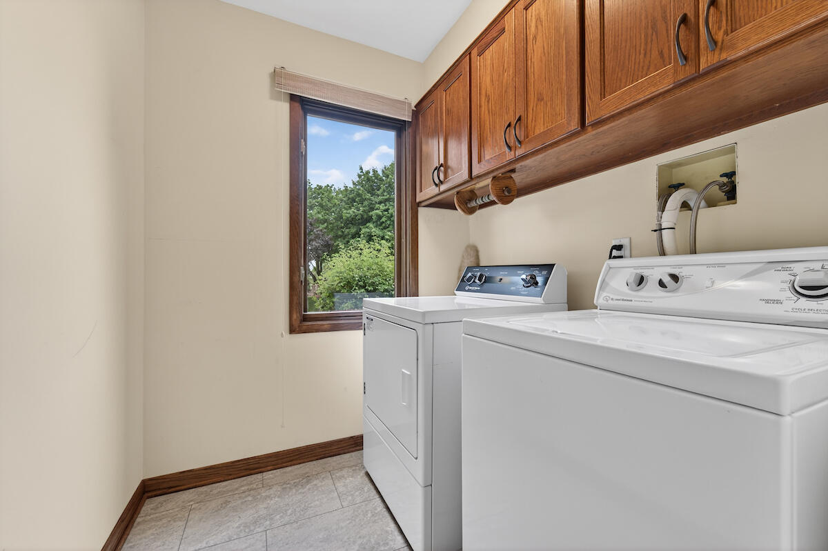 6028 Quaker Hill Road Mount Pleasant, WI 53406 - Photo 33 of 50 First Floor Laundry Room