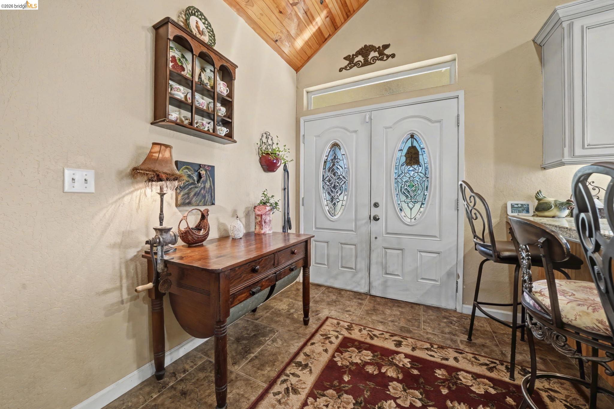 6145 Swiss Ranch Road Mountain Ranch, CA 95246 - Photo 11 of 60 a view of a workspace with furniture