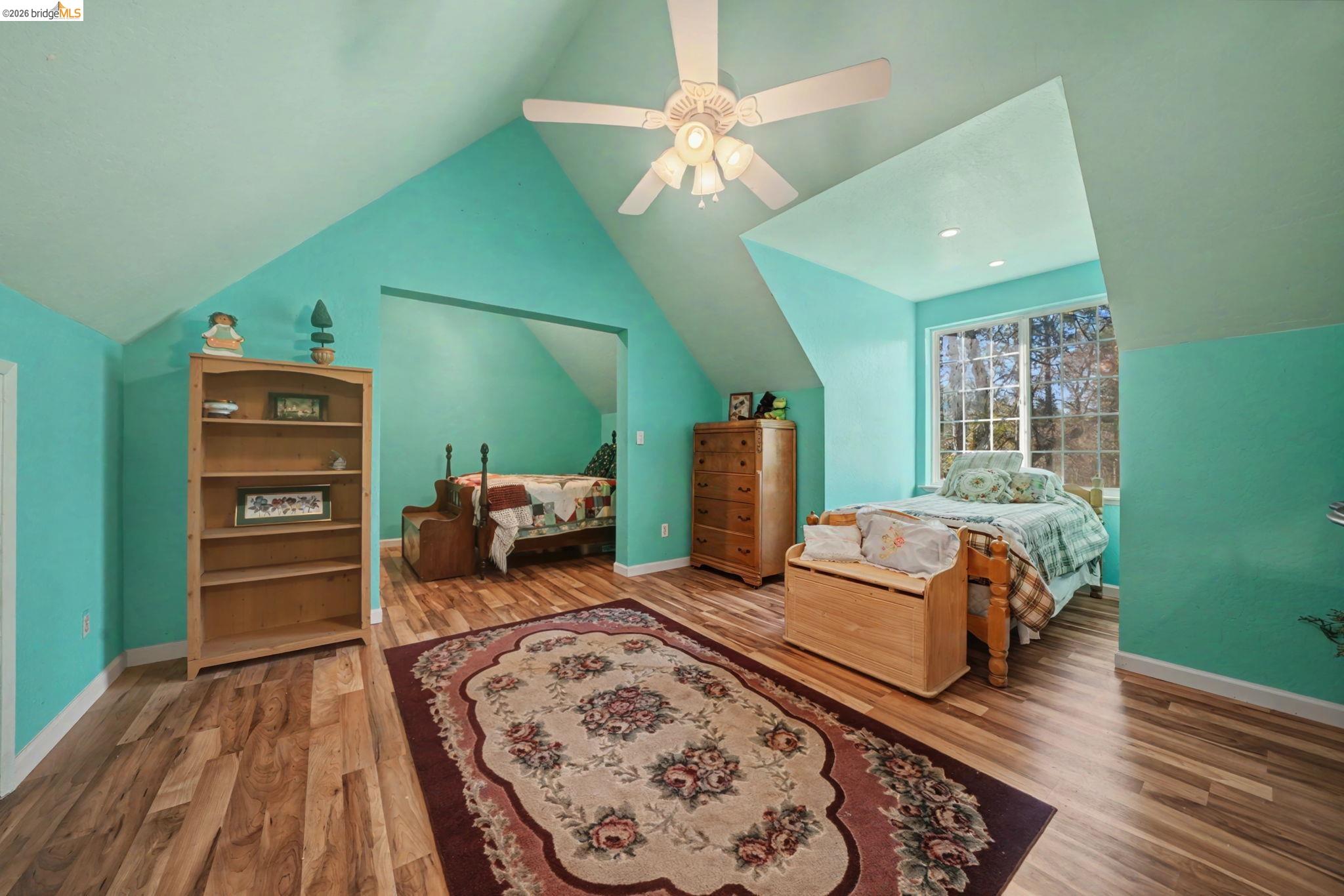 6145 Swiss Ranch Road Mountain Ranch, CA 95246 - Photo 41 of 60 Bedroom with wood finished floors, ceiling fan, and vaulted ceiling