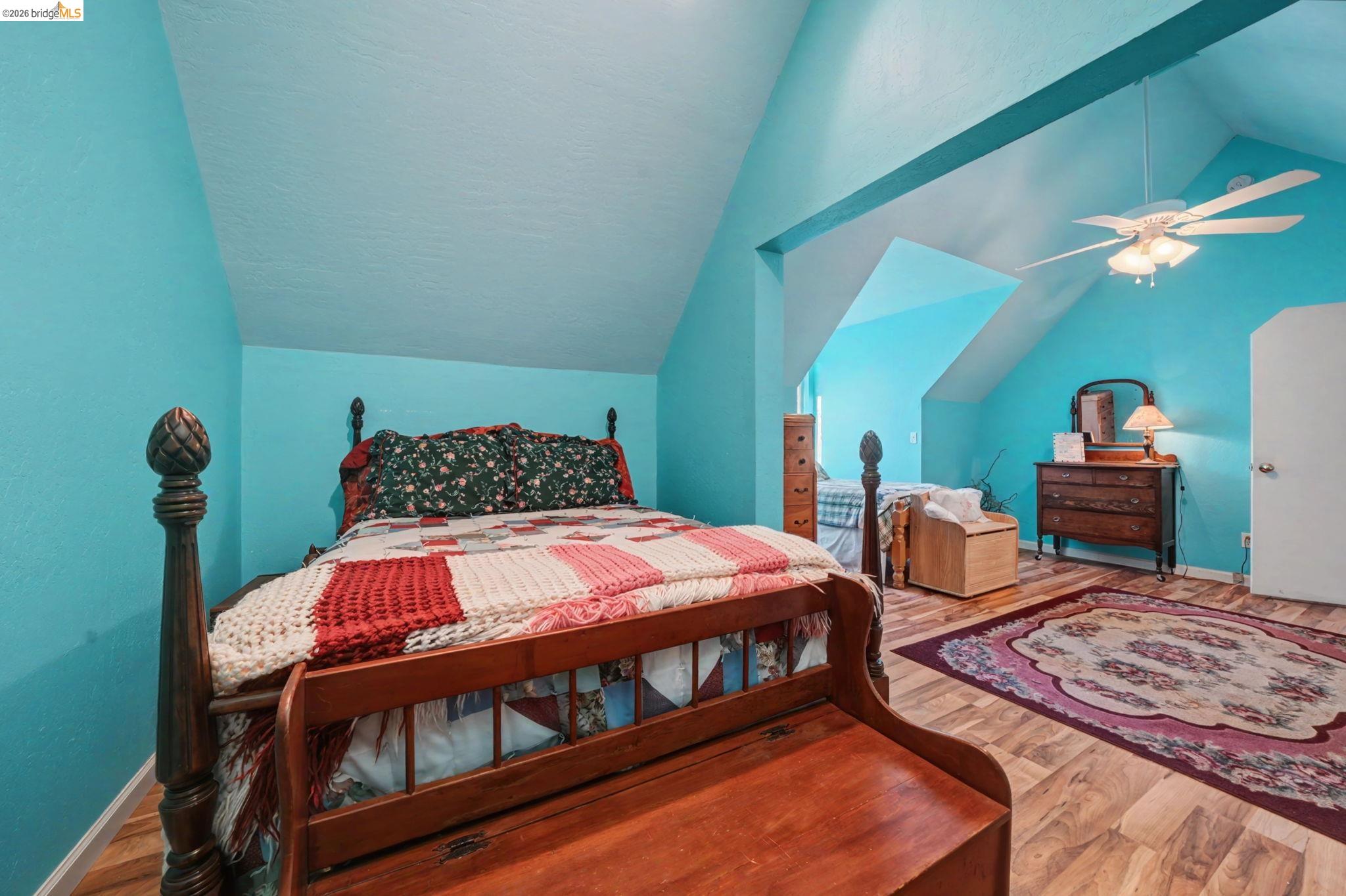 6145 Swiss Ranch Road Mountain Ranch, CA 95246 - Photo 46 of 60 Bedroom with wood finished floors, vaulted ceiling, and a ceiling fan