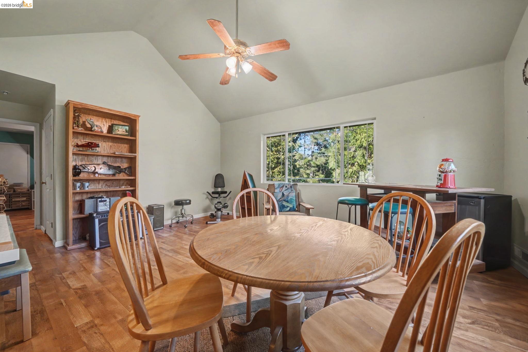 6145 Swiss Ranch Road Mountain Ranch, CA 95246 - Photo 52 of 60 a view of a dining room with furniture window and wooden floor