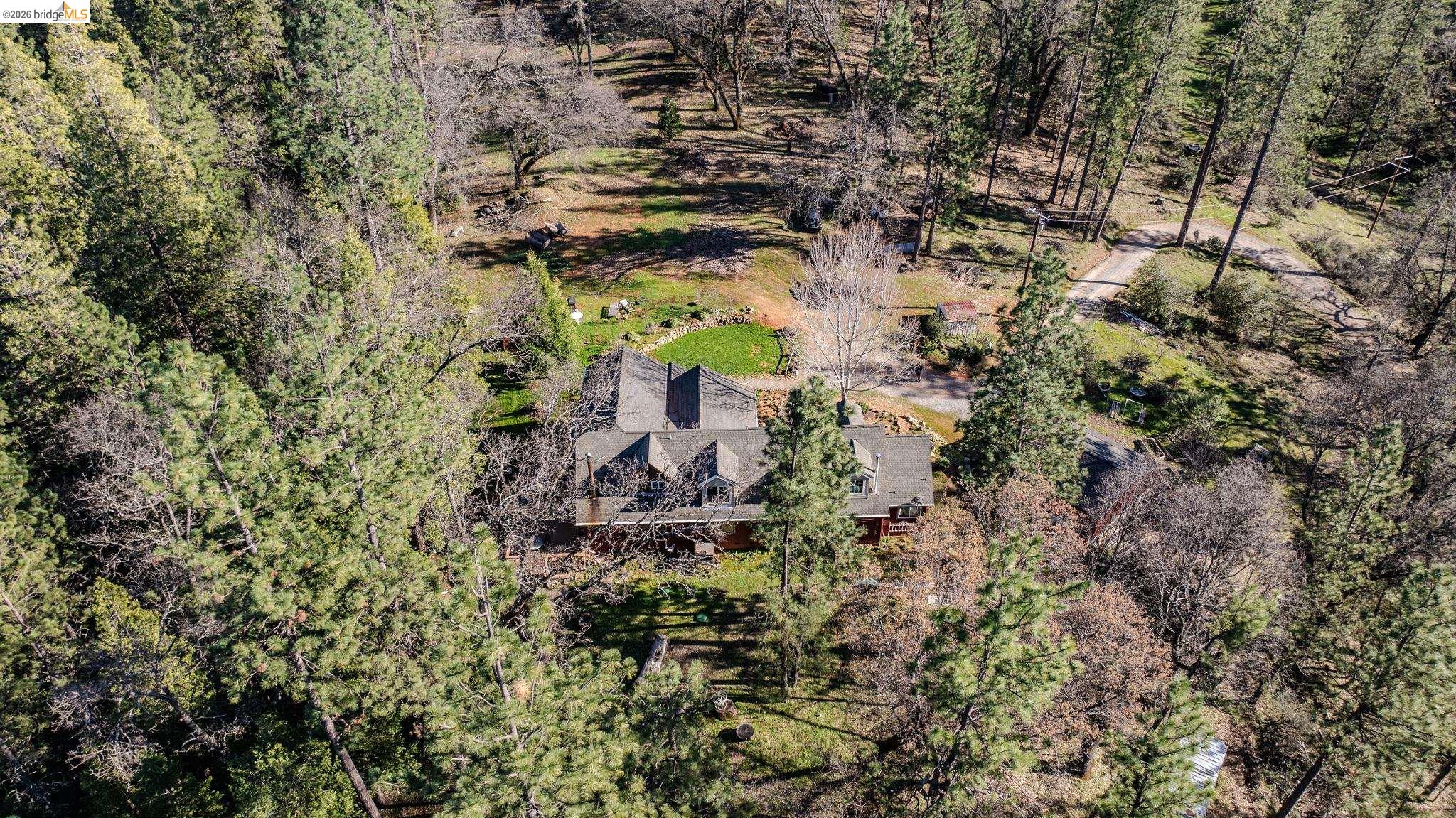 6145 Swiss Ranch Road Mountain Ranch, CA 95246 - Photo 58 of 60 a aerial view of a house with a yard