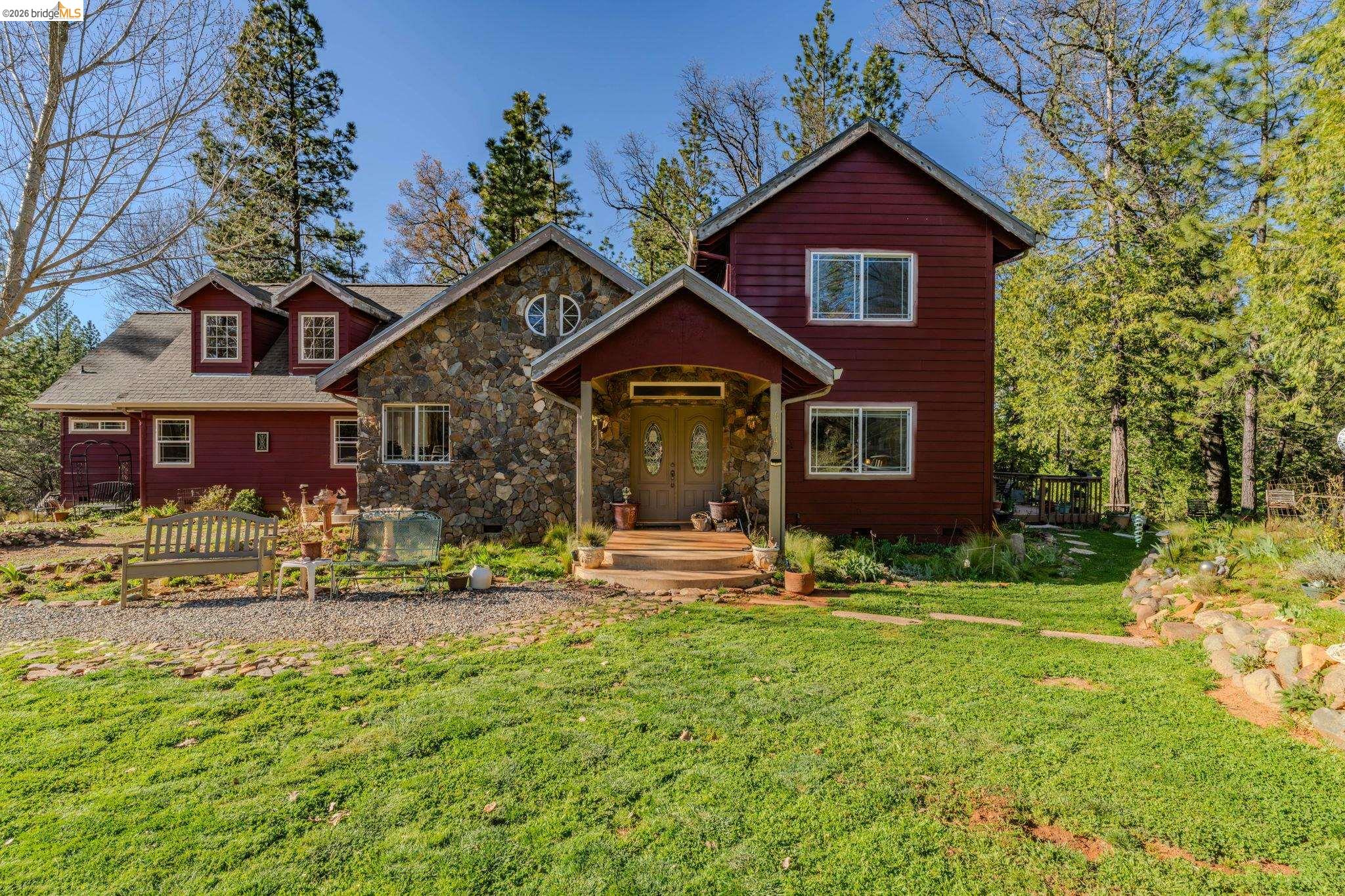 6145 Swiss Ranch Road Mountain Ranch, CA 95246 - Photo 7 of 60 Rustic home with a front yard and stone siding