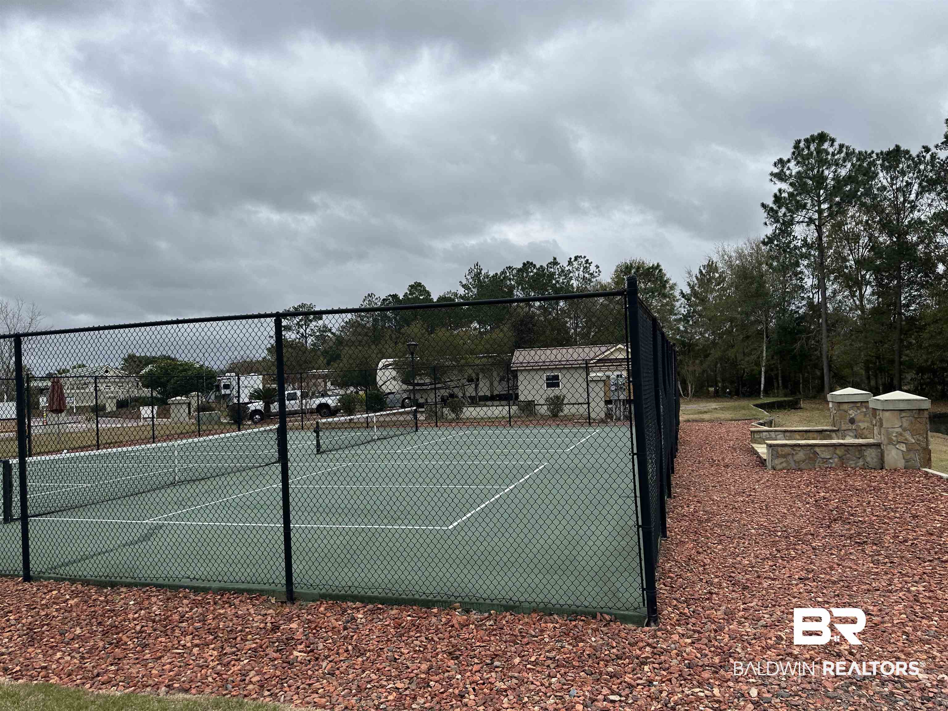 12489 Gateway Drive Elberta, AL 36530 - Photo 45 of 55 View of tennis court with fence