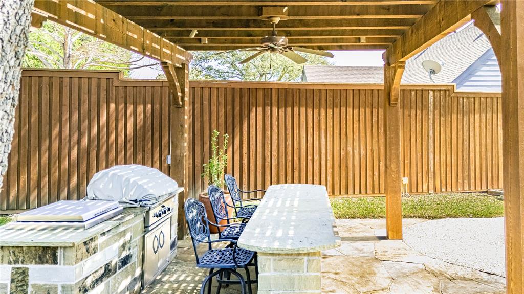 2605 Rothland Lane Plano, TX 75023 - Photo 37 of 40 a balcony with table and chairs