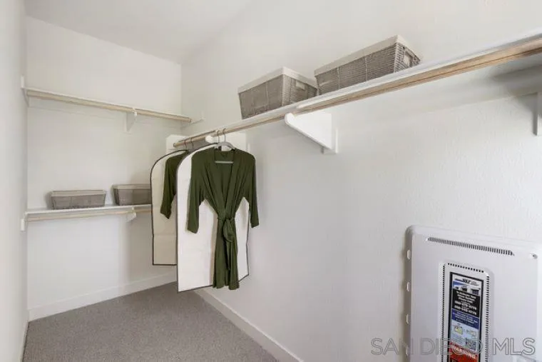 2220 South Ava Glen, Unit 906 Escondido, CA 92025 - Photo 18 of 23 a view of a walk in closet
