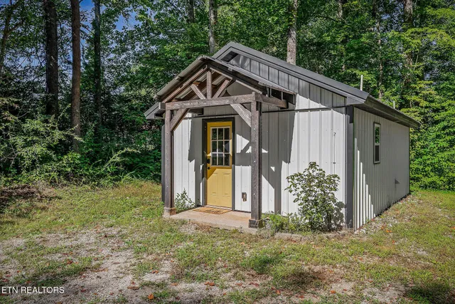 a house with trees in front of it