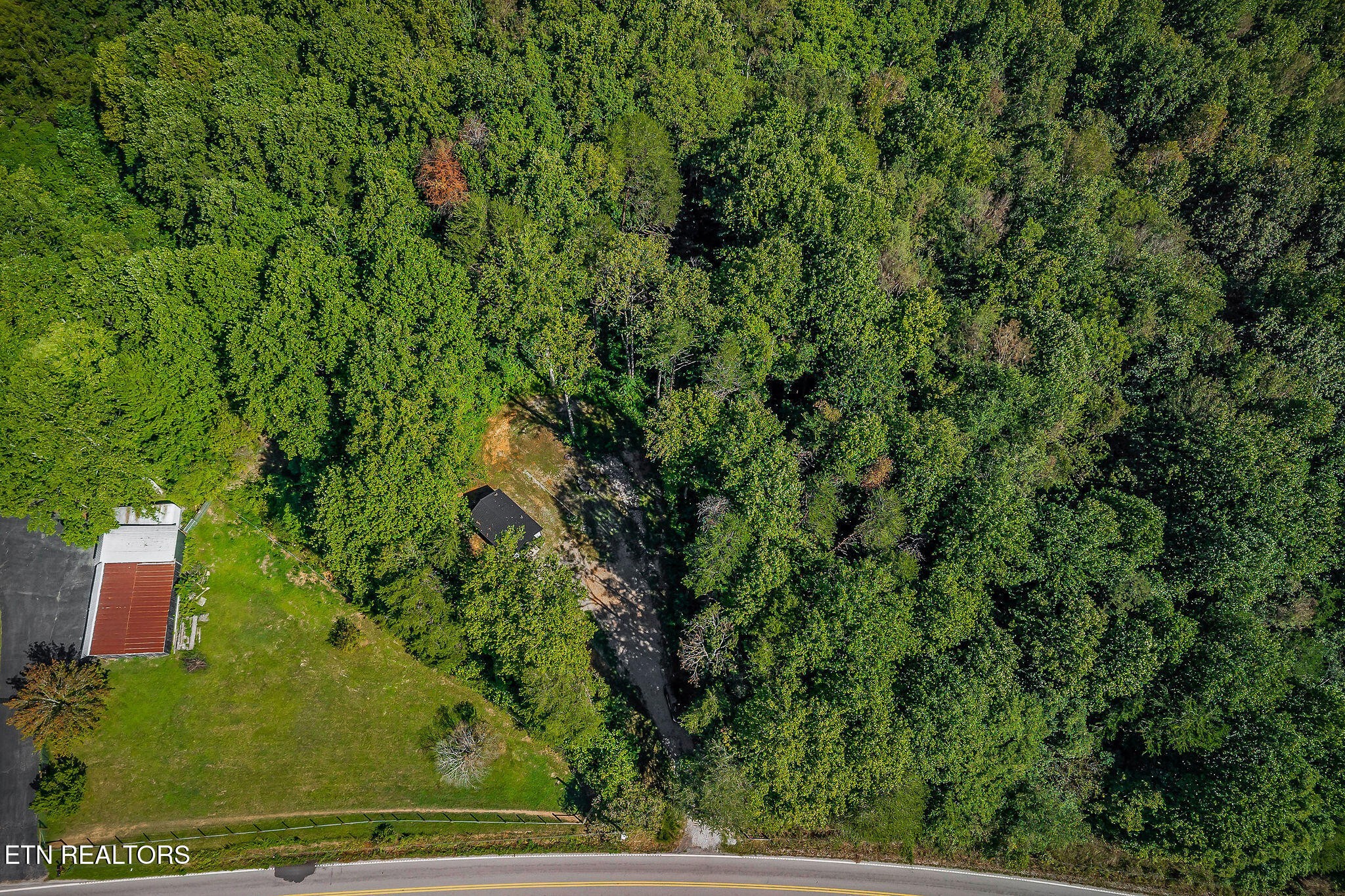 3247 Moodyville Road Byrdstown, TN 38549 - Photo 15 of 27 an aerial view of residential house with outdoor space and trees all around