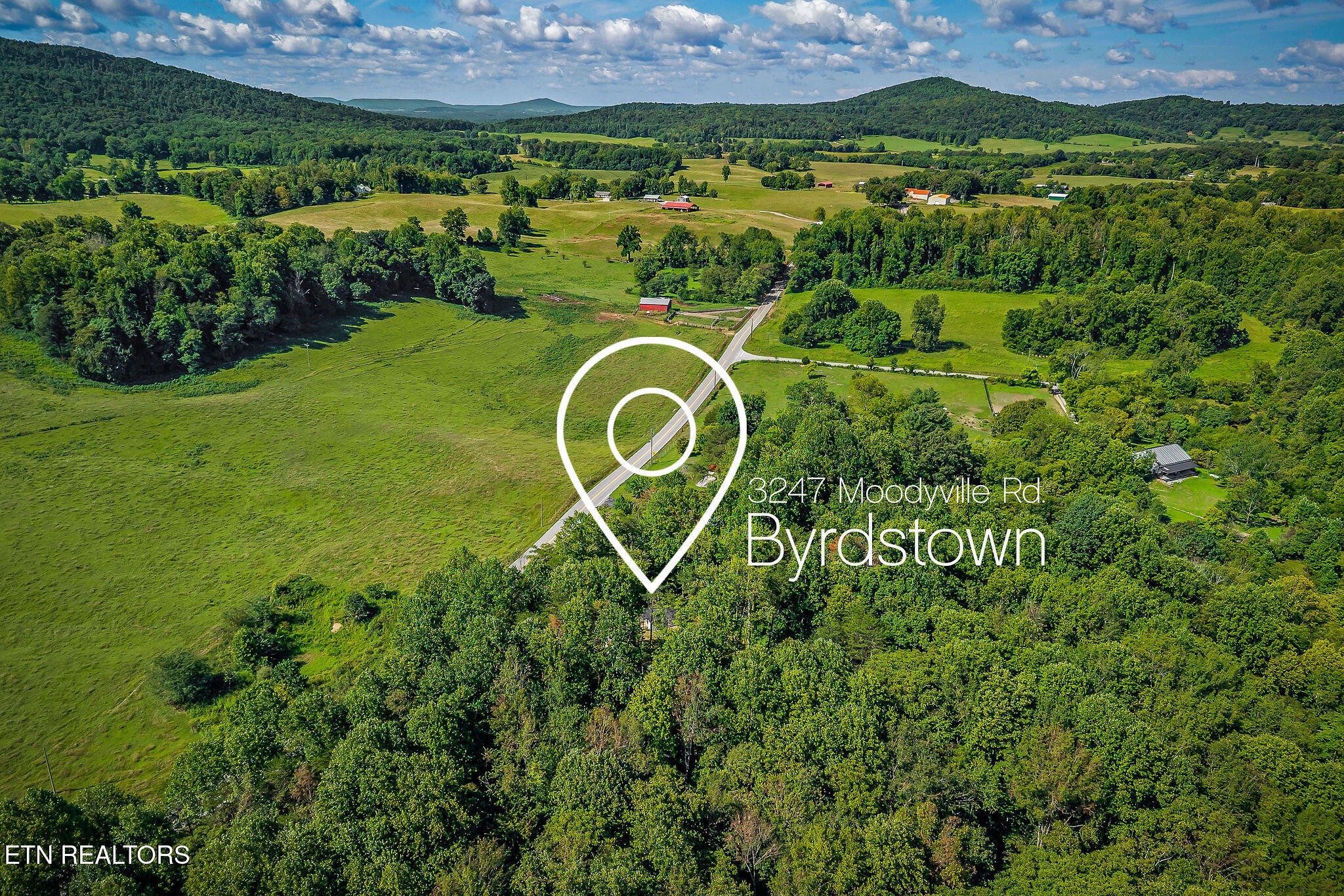 3247 Moodyville Road Byrdstown, TN 38549 - Photo 20 of 27 a view of a golf course with a garden