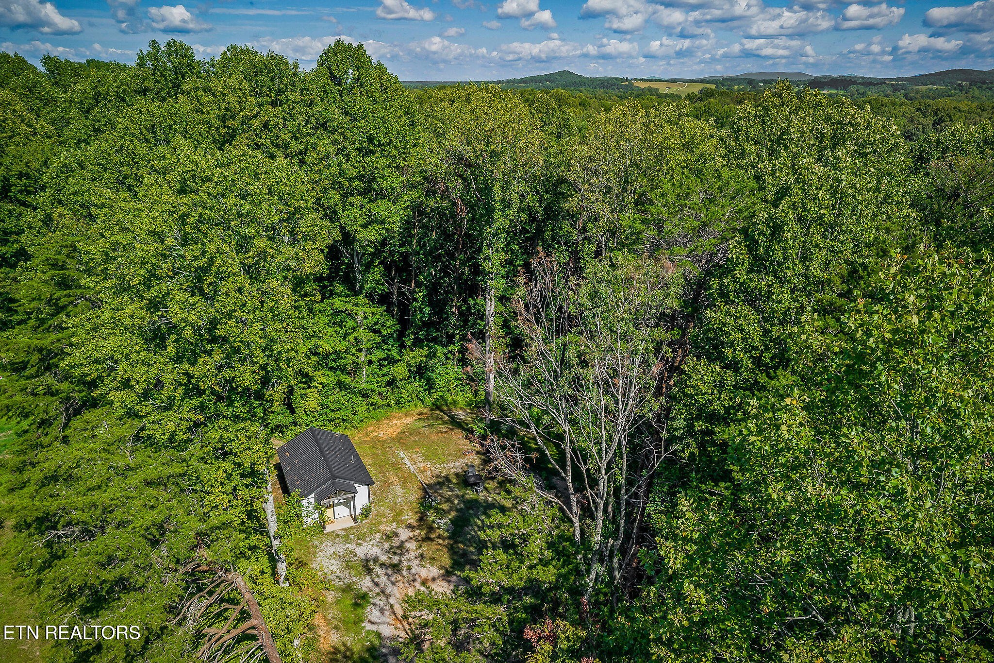 3247 Moodyville Road Byrdstown, TN 38549 - Photo 22 of 27 a view of a backyard