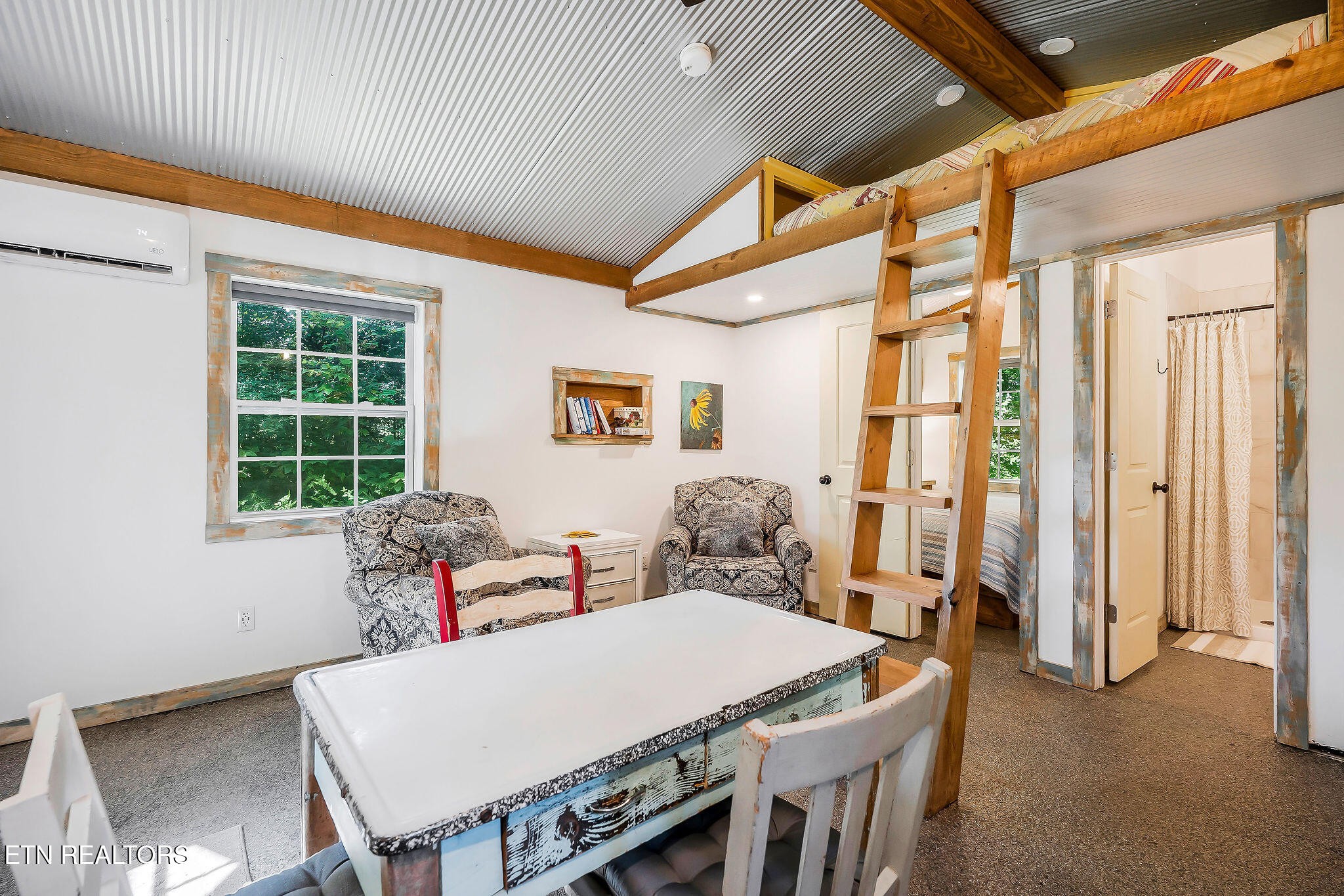 3247 Moodyville Road Byrdstown, TN 38549 - Photo 7 of 27 a dining room with furniture and window
