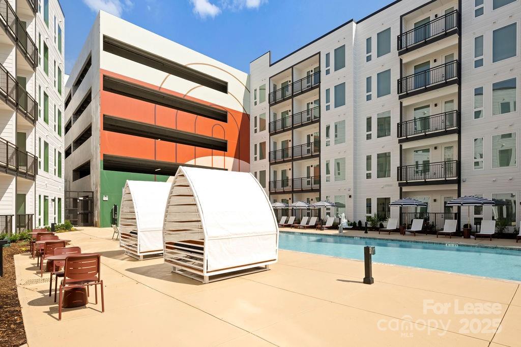 4101 Raleigh Street, Unit S2 Charlotte, NC 28206 - Photo 2 of 48 a view of a building with sitting area