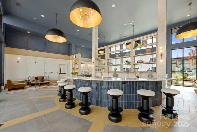 a kitchen with a sink and a stove