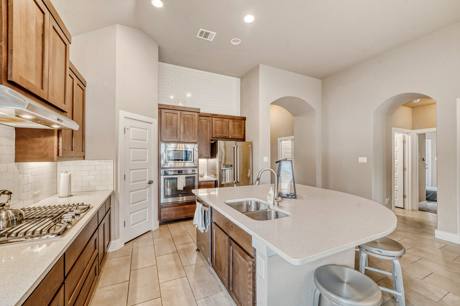 3317 Nighthawk Dive Lane Pflugerville, TX 78660 - Photo 7 of 34 Kitchen is open to dining and family room.