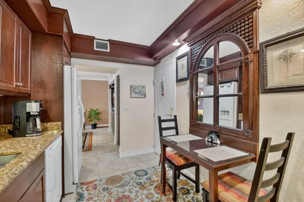 a view of a dining room with furniture