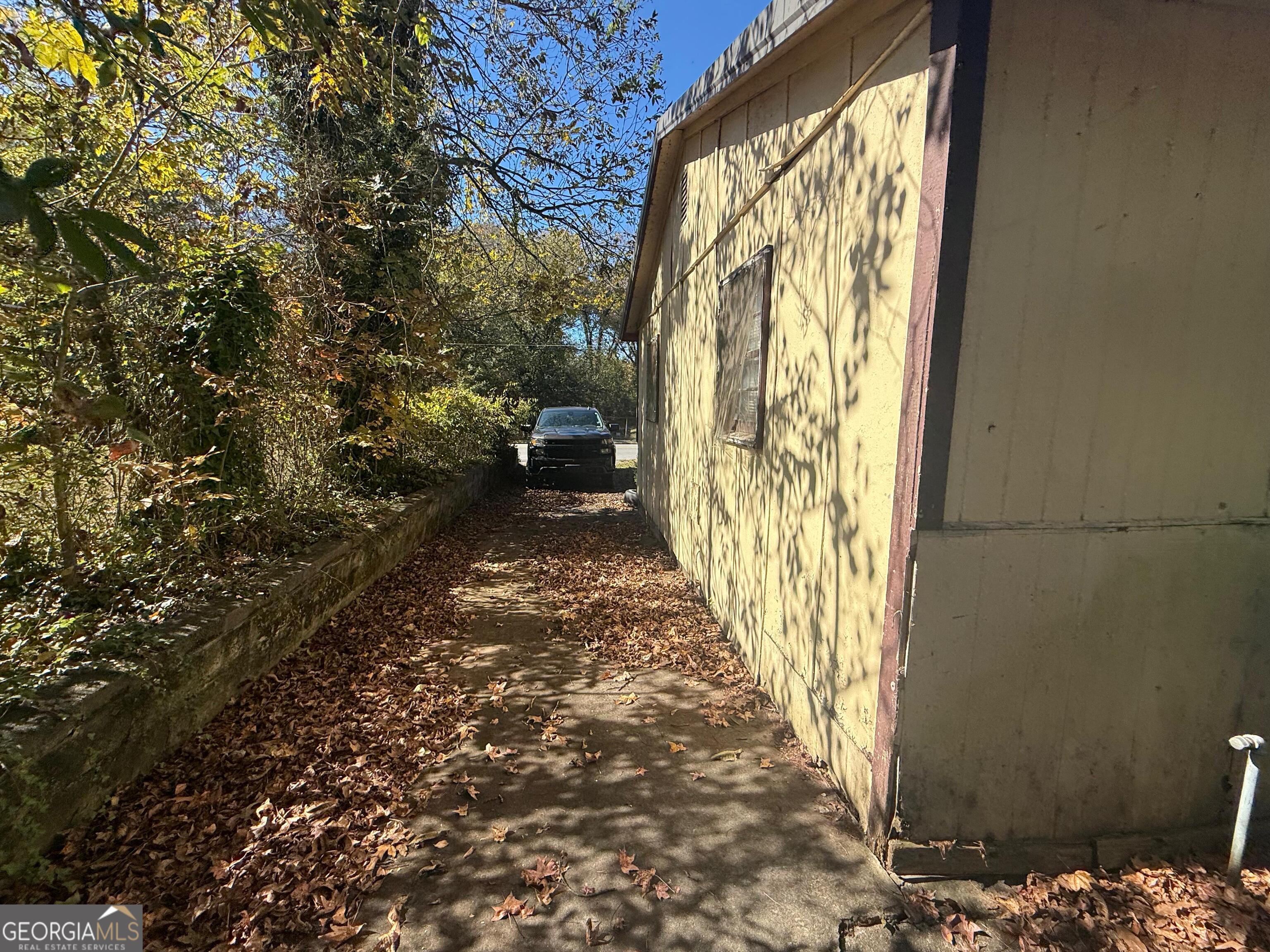 415 Branham Avenue Southwest Rome, GA 30161 - Photo 2 of 15 a view of a narrow alley
