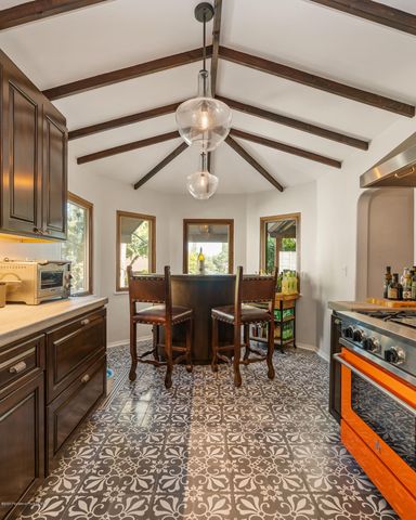 a view of a dining room with furniture