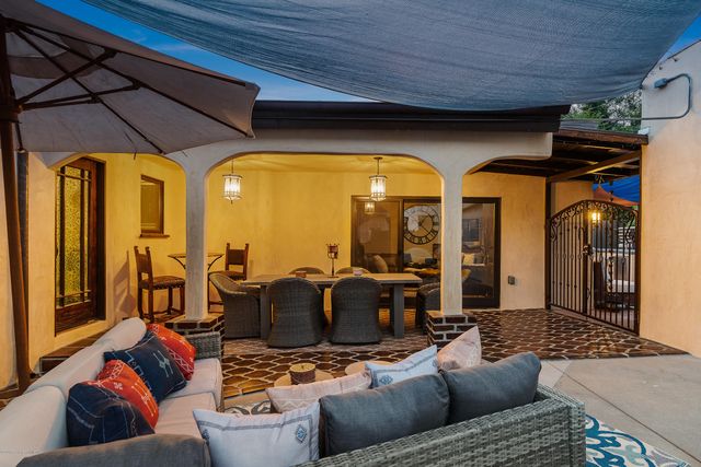 a view of a livingroom with furniture and front door