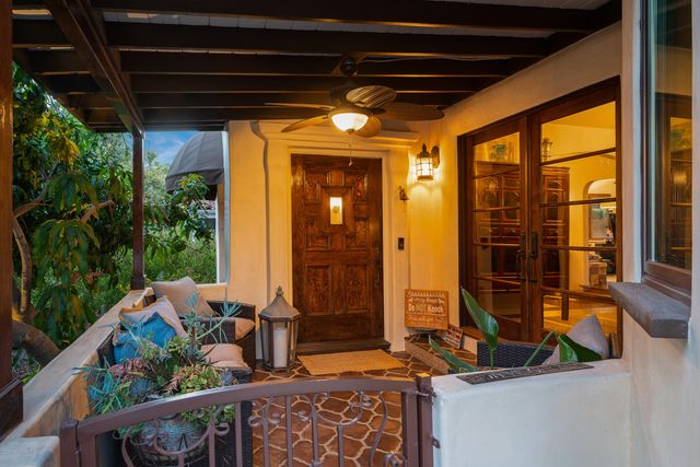 a view of balcony with furniture