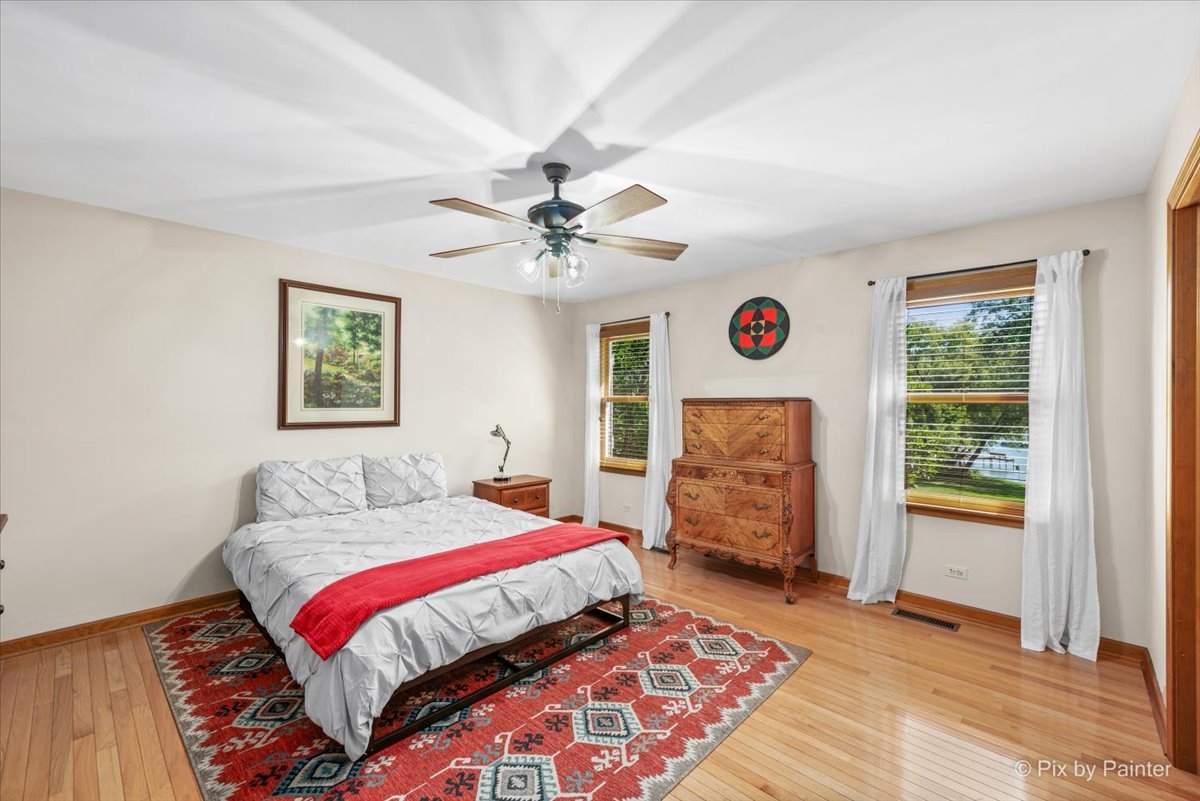 28683 Rivers Edge Drive Cary, IL 60013 - Photo 19 of 31 a bedroom with a bed and a window
