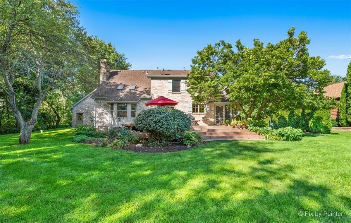28683 Rivers Edge Drive Cary, IL 60013 - Photo 24 of 31 a front view of a house with a yard