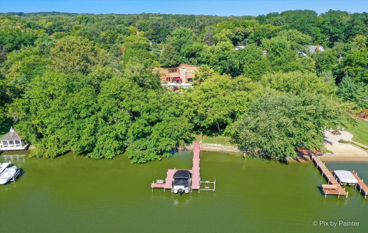 28683 Rivers Edge Drive Cary, IL 60013 - Photo 29 of 31 a backyard space with large trees and plants