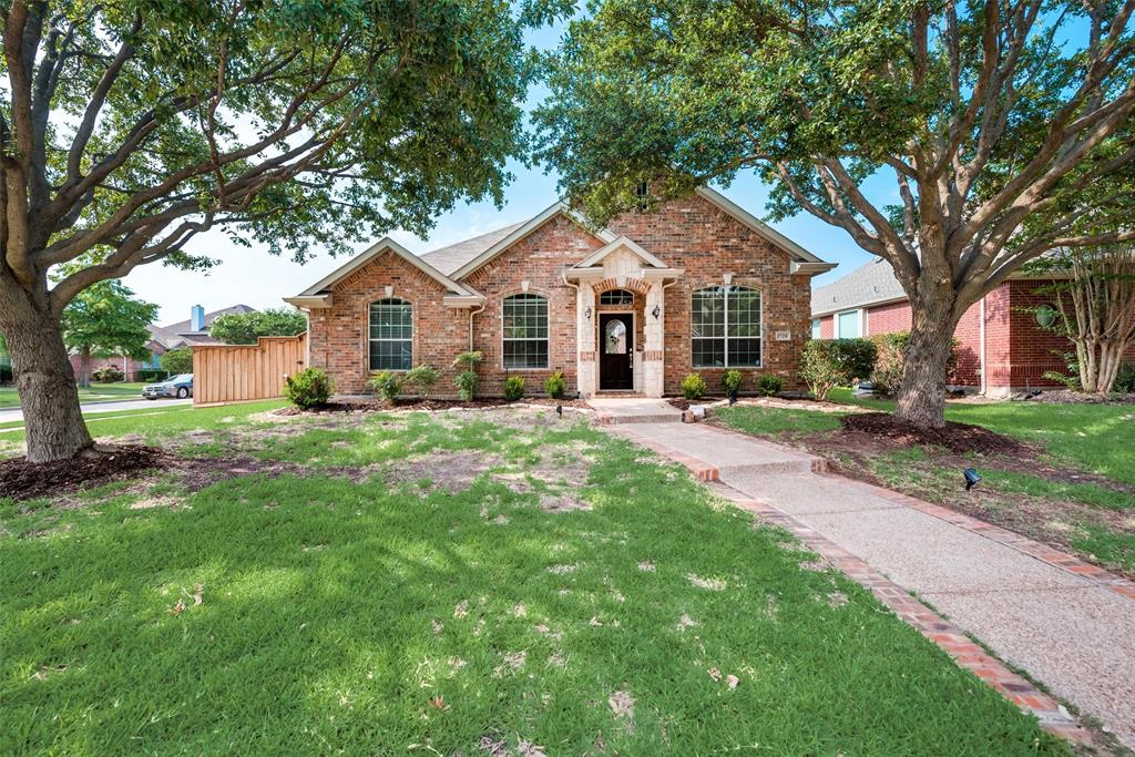 1728 Bentley Drive Frisco, TX 75033 - Photo 1 of 1 a front view of a house with a yard and trees