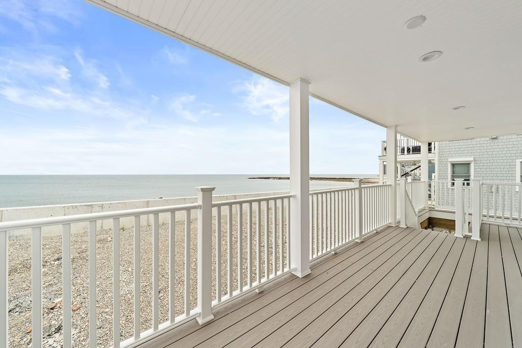 308 Ocean Street Marshfield, MA 02050 - Photo 16 of 42 a view of a balcony with wooden floor