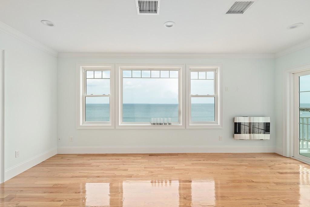 308 Ocean Street Marshfield, MA 02050 - Photo 17 of 42 a view of an empty room with a window