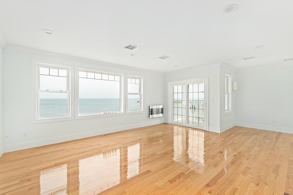 308 Ocean Street Marshfield, MA 02050 - Photo 18 of 42 a view of an empty room with a window