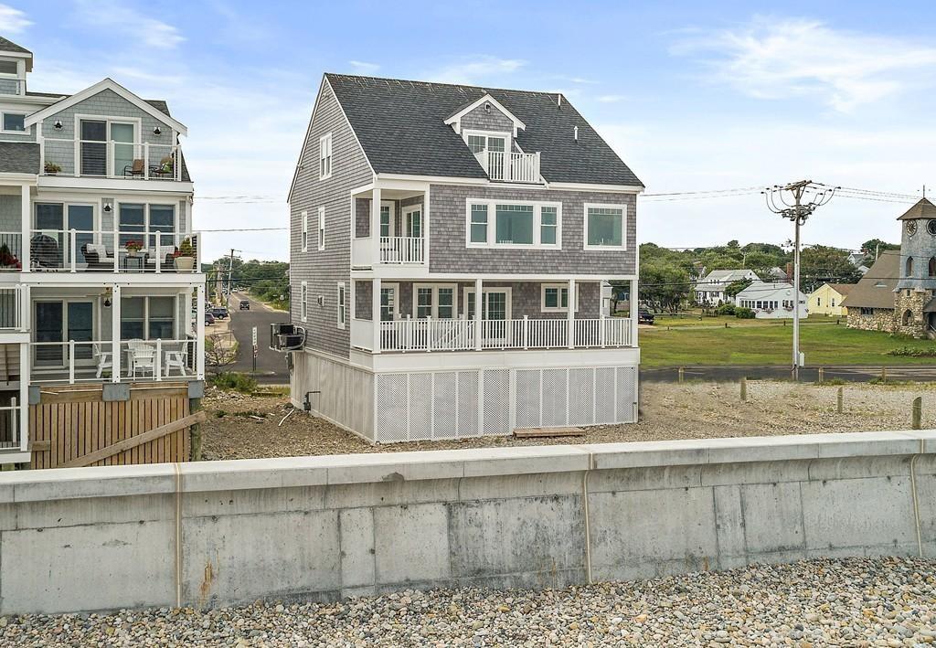 308 Ocean Street Marshfield, MA 02050 - Photo 3 of 42 a front view of a house with a yard