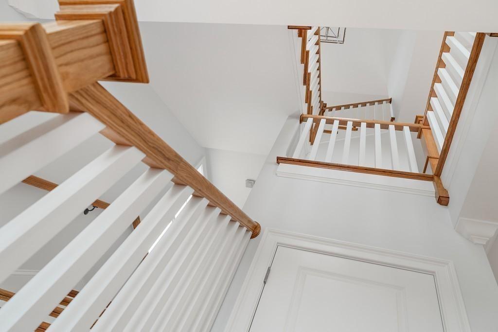 308 Ocean Street Marshfield, MA 02050 - Photo 39 of 42 a view of staircase with white walls and a window