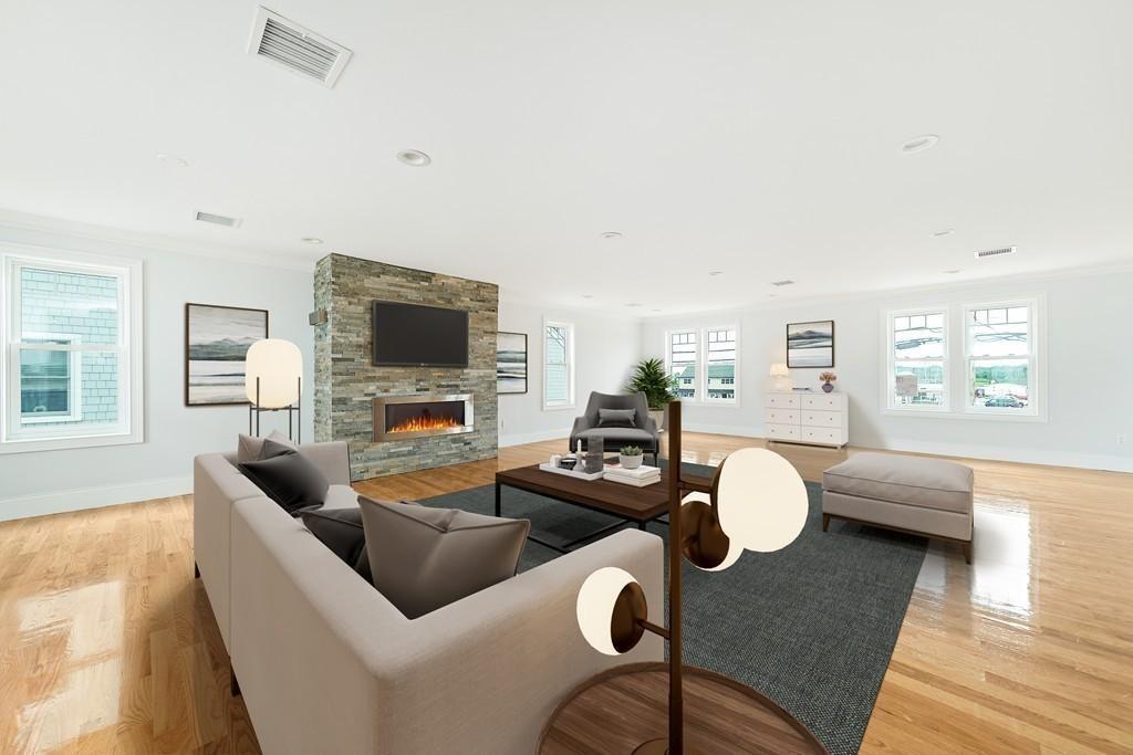 308 Ocean Street Marshfield, MA 02050 - Photo 10 of 42 a living room with furniture and a flat screen tv