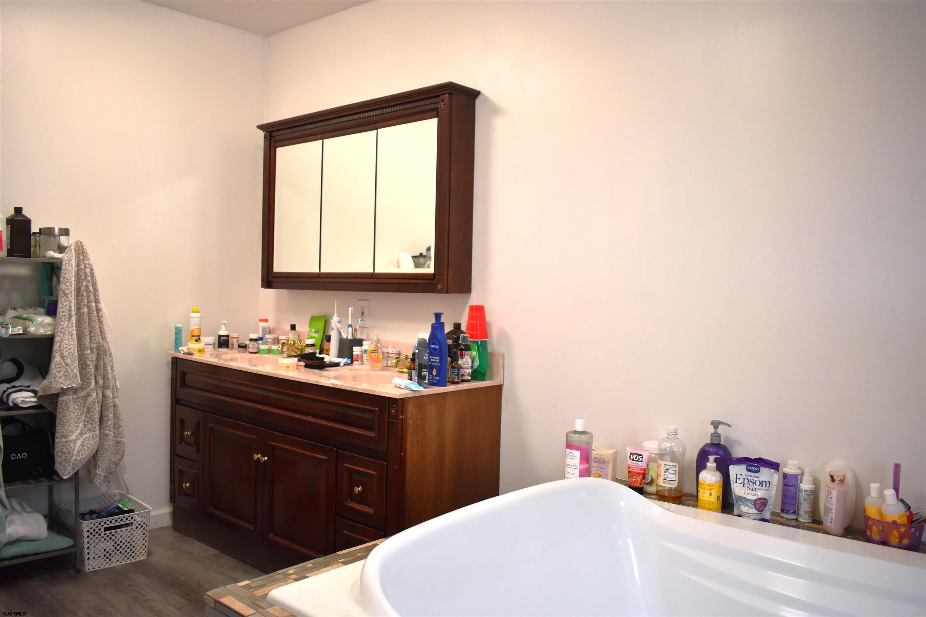 720 6th Road Newtonville, NJ 08346 - Photo 12 of 23 a bedroom with a bed and a window