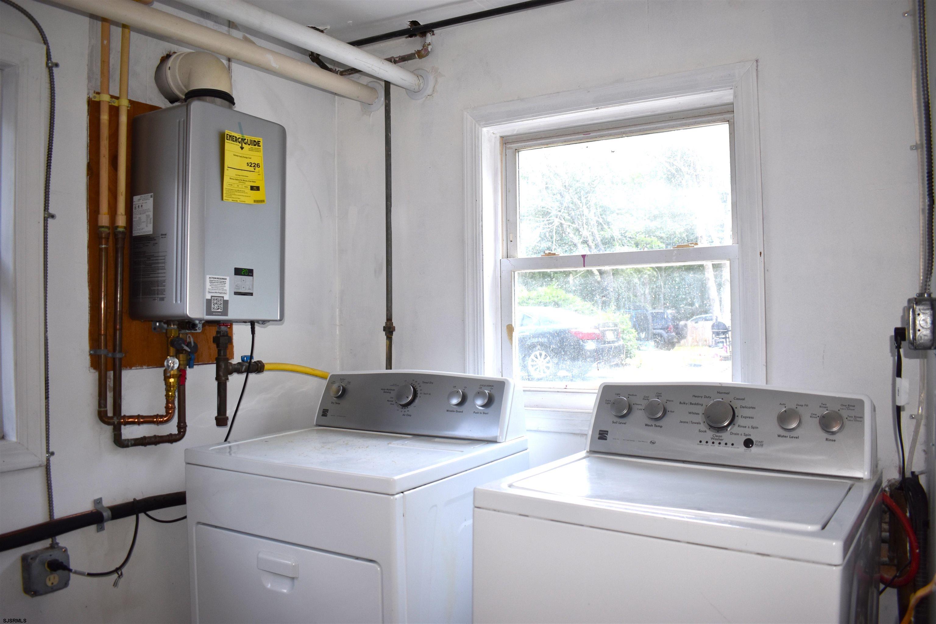 720 6th Road Newtonville, NJ 08346 - Photo 23 of 23 a utility room with dryer and washer