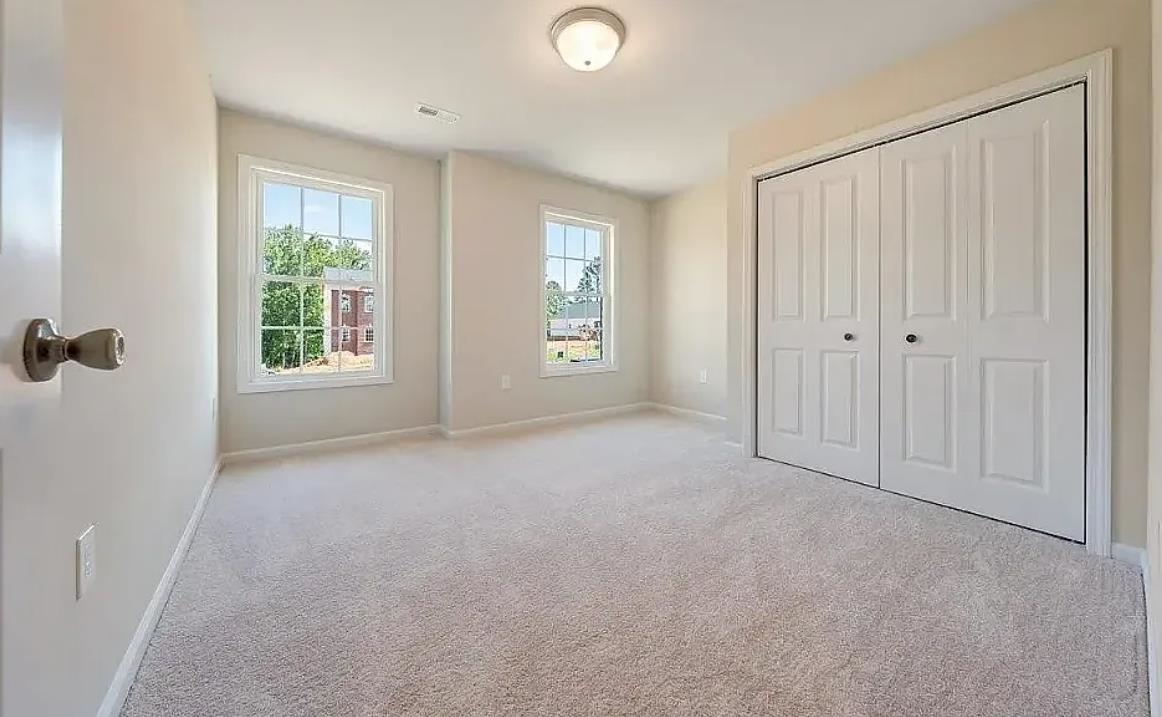 201 Winnbrook Street Staunton, VA 24401 - Photo 7 of 12 a view of an empty room with a window