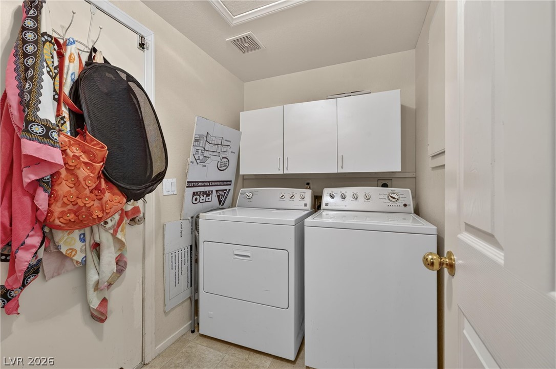 2247 Ramsgate Drive, Unit 2247 Henderson, NV 89074 - Photo 12 of 50 A dedicated laundry space provides practical, convenient, and efficient washing and drying capabilities for household needs.